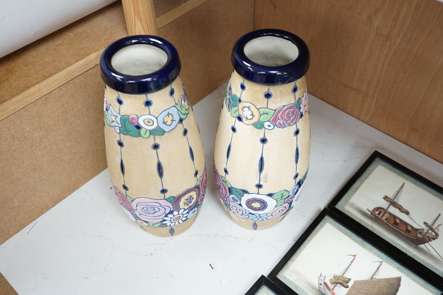A pair of pottery Czech Amphora Art Deco pottery vases, with unusual high enamel stylised floral pattern, stamped Amphora to base, 31cm high